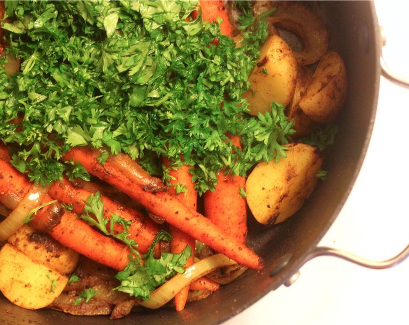 step 8 Stir in most of parsley (1/2 cup) and cilantro (1/4).