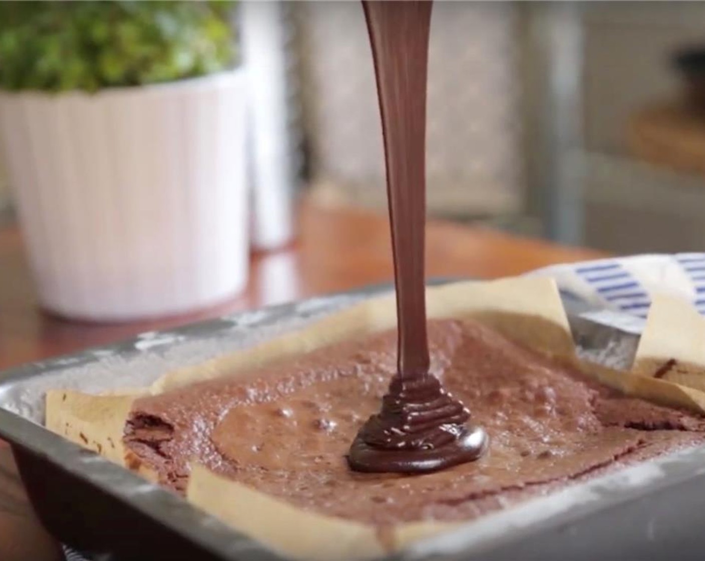 step 12 Pour ganache over brownies and spread into an even layer. Refrigerate for 20 to 30 minutes.