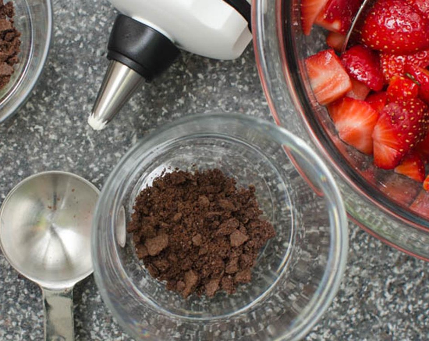 step 8 In a clear parfait glass or wine glass with a wide mouth, sprinkle a tablespoon of the crushed chocolate wafer cookies.