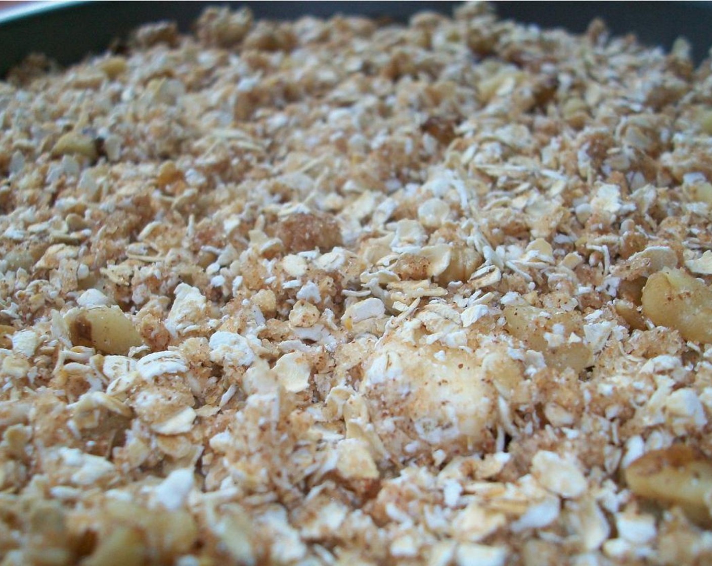 step 4 To minimize clean up, I combined Quick Cooking Oats (1/2 cup), Walnuts (2 Tbsp), Brown Sugar (2 Tbsp), Butter (2 Tbsp), and Simply Organic Cinnamon, Ground (1/2 tsp) in the same bowl as the cake. Use a fork to incorporate the butter into the oatmeal mixture.