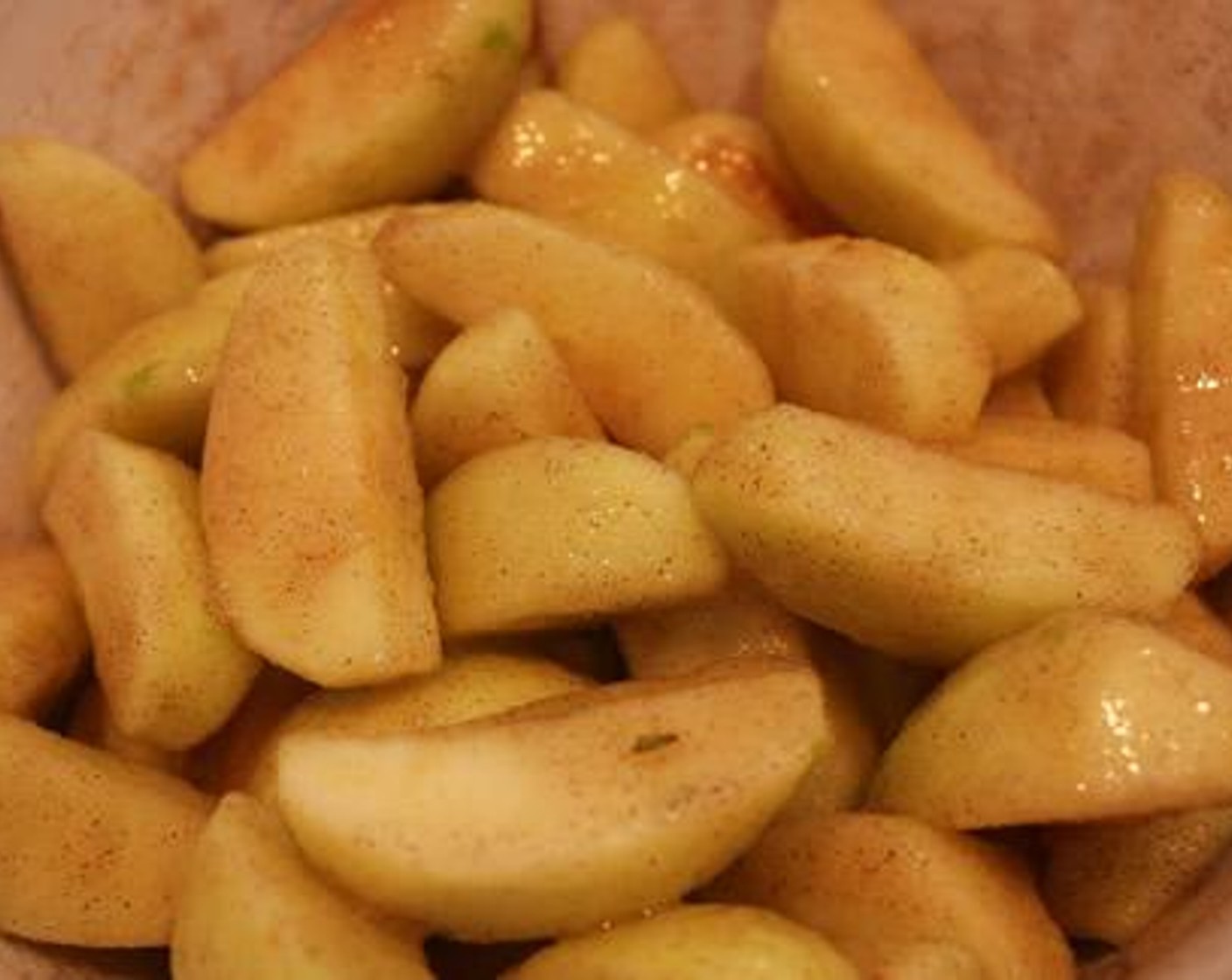 step 1 PlaceGranny Smith Apples (7) in a large bowl. Add Granulated Sugar (1 cup) and Ground Cinnamon (1 tsp), toss to coat apples, and let sit for 1 hour.