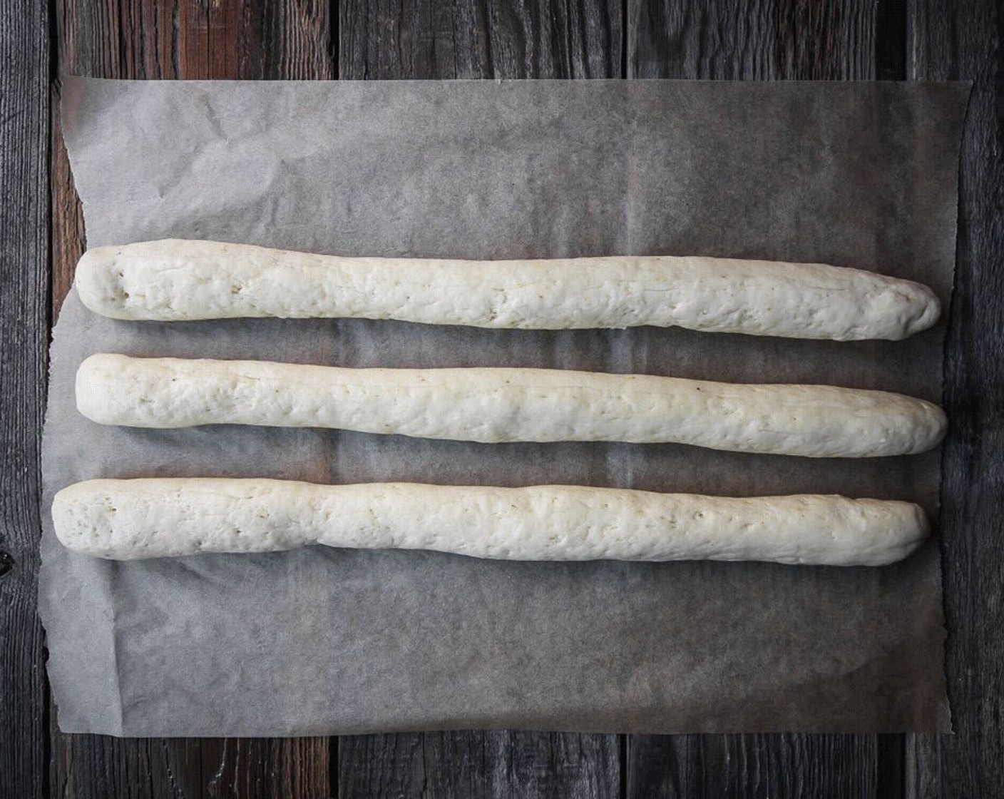 step 15 To make braided bread, divide the dough into three equally sized pieces (you can use a scale to get them identical). Shape each piece into an 18" long rope.