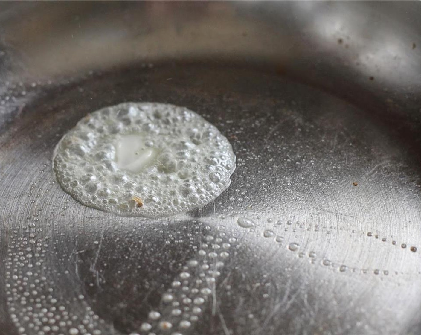 step 2 Place a pat of butter into a crepe or omelet pan. Heat pan on medium low heat. Once the butter is melted, use a spatula to rub it evenly throughout the pan. This creates a nice, non-stick surface of a non-teflon pan.