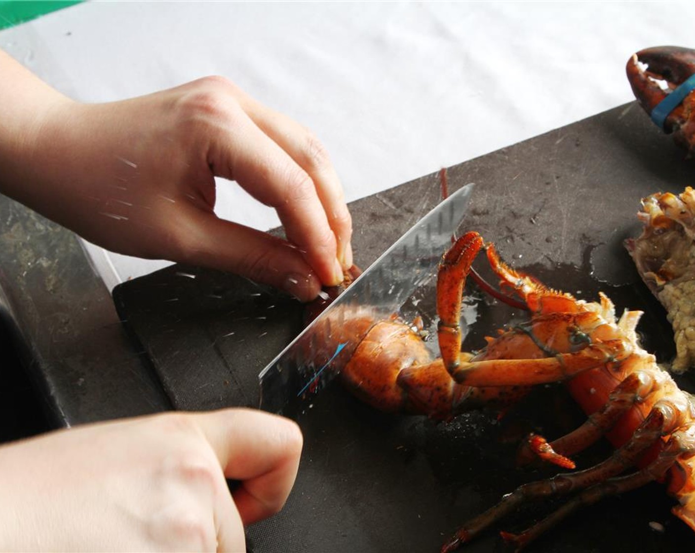 step 2 Remove the claws and hit gently with the back of the knife.