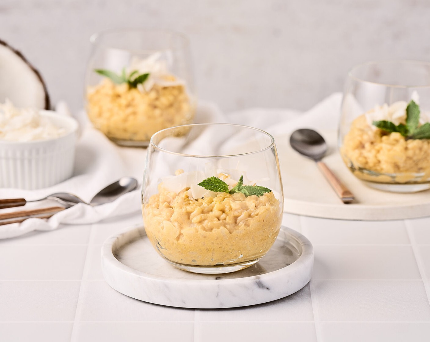 step 2 Once the rice is cooked, add the Sweetened Condensed Milk (2/3 cup), mix, and remove from heat. Serve warm or chilled in small cups or glasses and finish with a sprinkle of Coconut Shavings (to taste) and Fresh Mint Leaves (as needed).