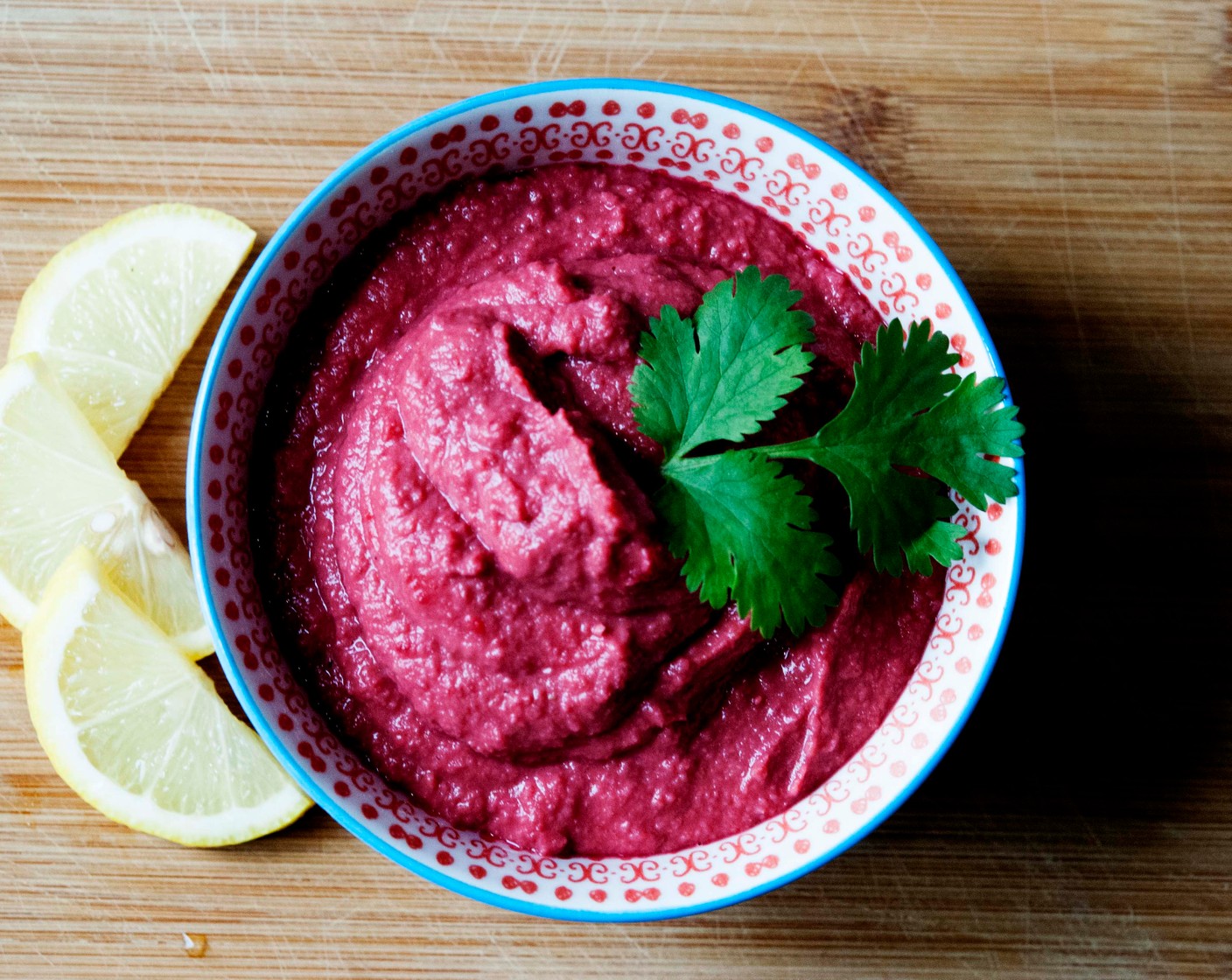 step 5 Once you have got a smooth and creamy consistency, transfer your hummus into a serving bowl and bring it up to your dining table with Pita Bread (to taste) and Mixed Vegetables (to taste).