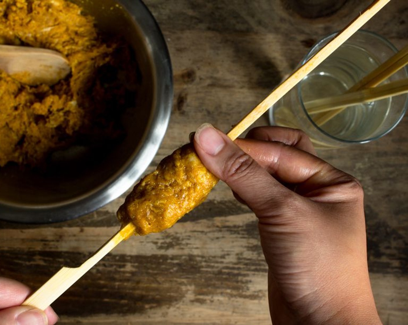 step 12 If there is an opening or hole on the openings of the meat, seal it well by pinching the openings and gently twisting your finger and then sliding it slightly towards the meatball. Continue to do this until all the meat is used up.