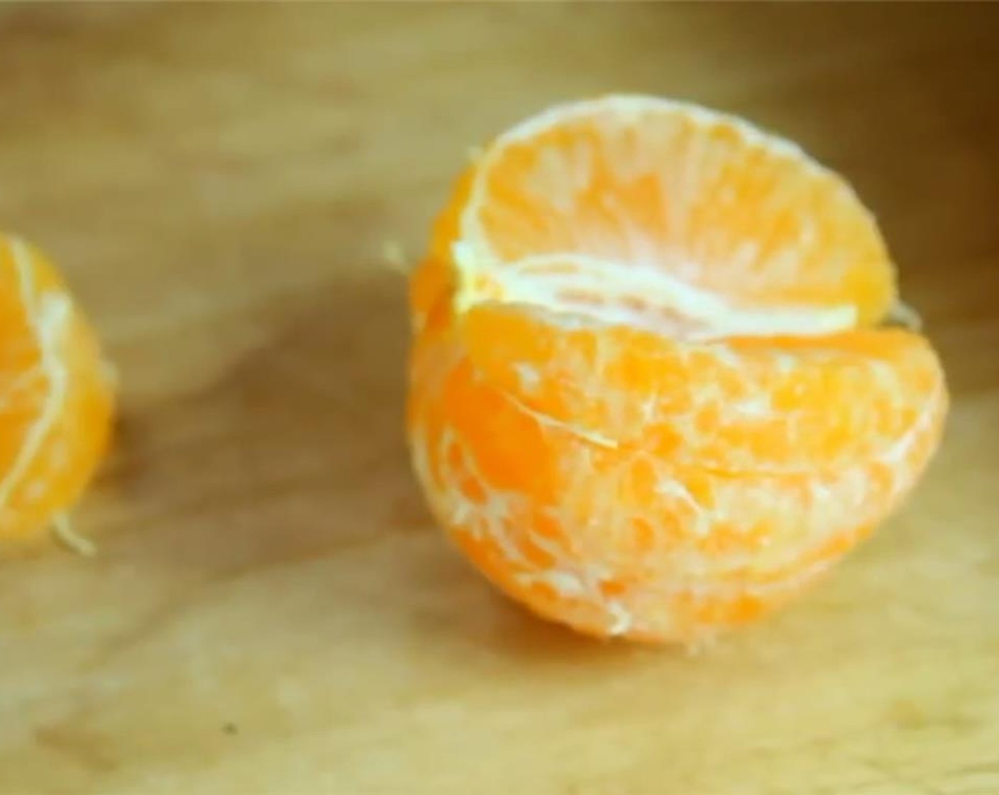step 5 Peel and separate the Mandarin Orange (1) into wedges.
