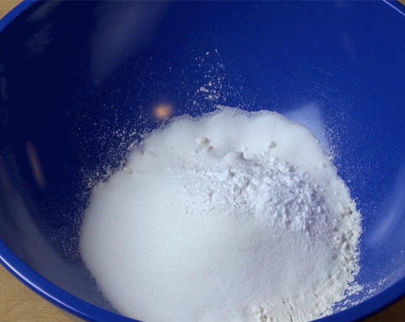 step 1 In a mixing bowl, combine the All-Purpose Flour (1 cup), Caster Sugar (1/3 cup), Baking Powder (3/4 tsp), and Baking Soda (3/4 tsp). Preheat your oven to 190 degrees C (375 degrees F).