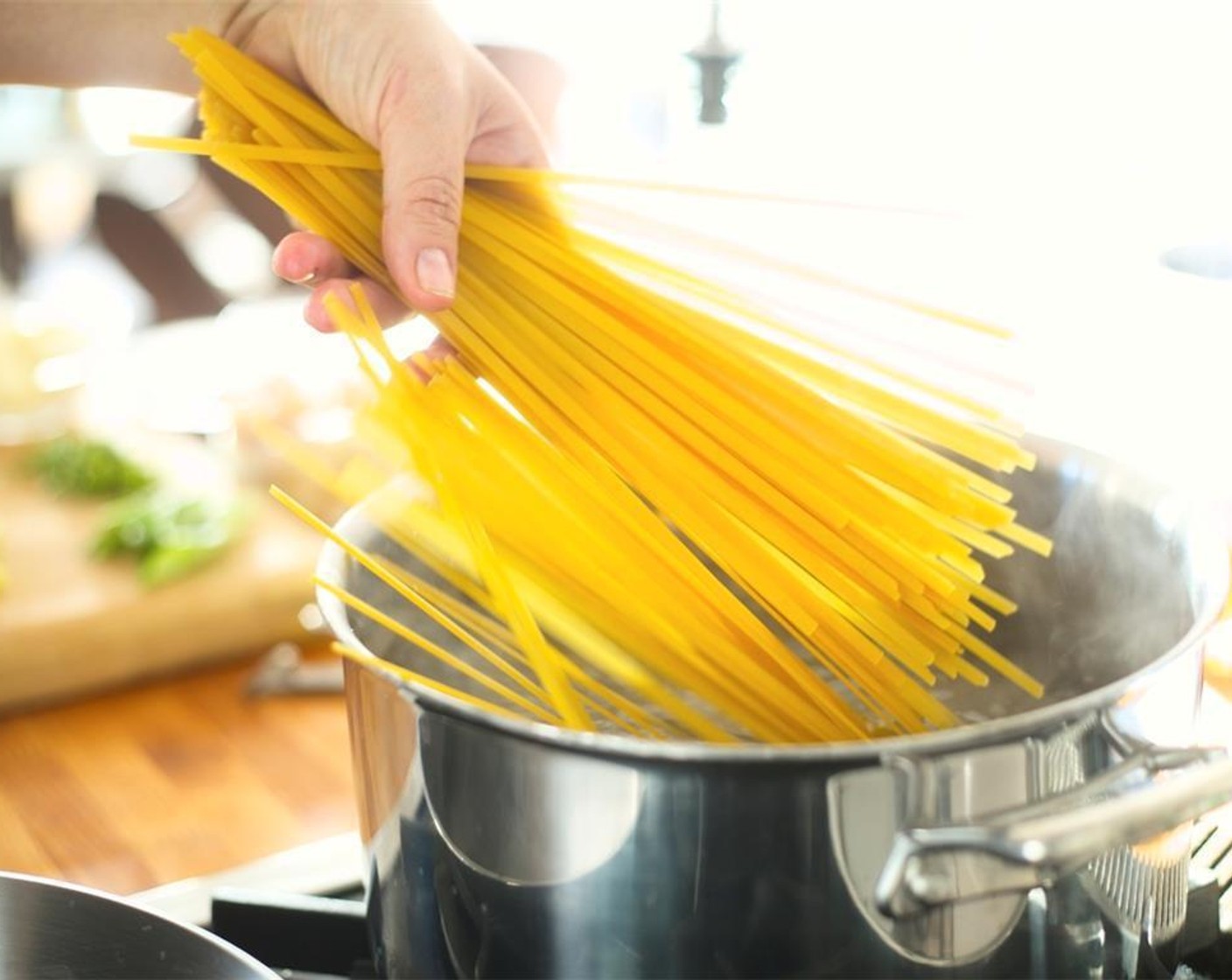 step 4 Bring eight cups of water to a boil with Salt (1 Tbsp) in a large saucepan. When water boils, add Fettuccine (8 oz) and cook for twelve minutes.