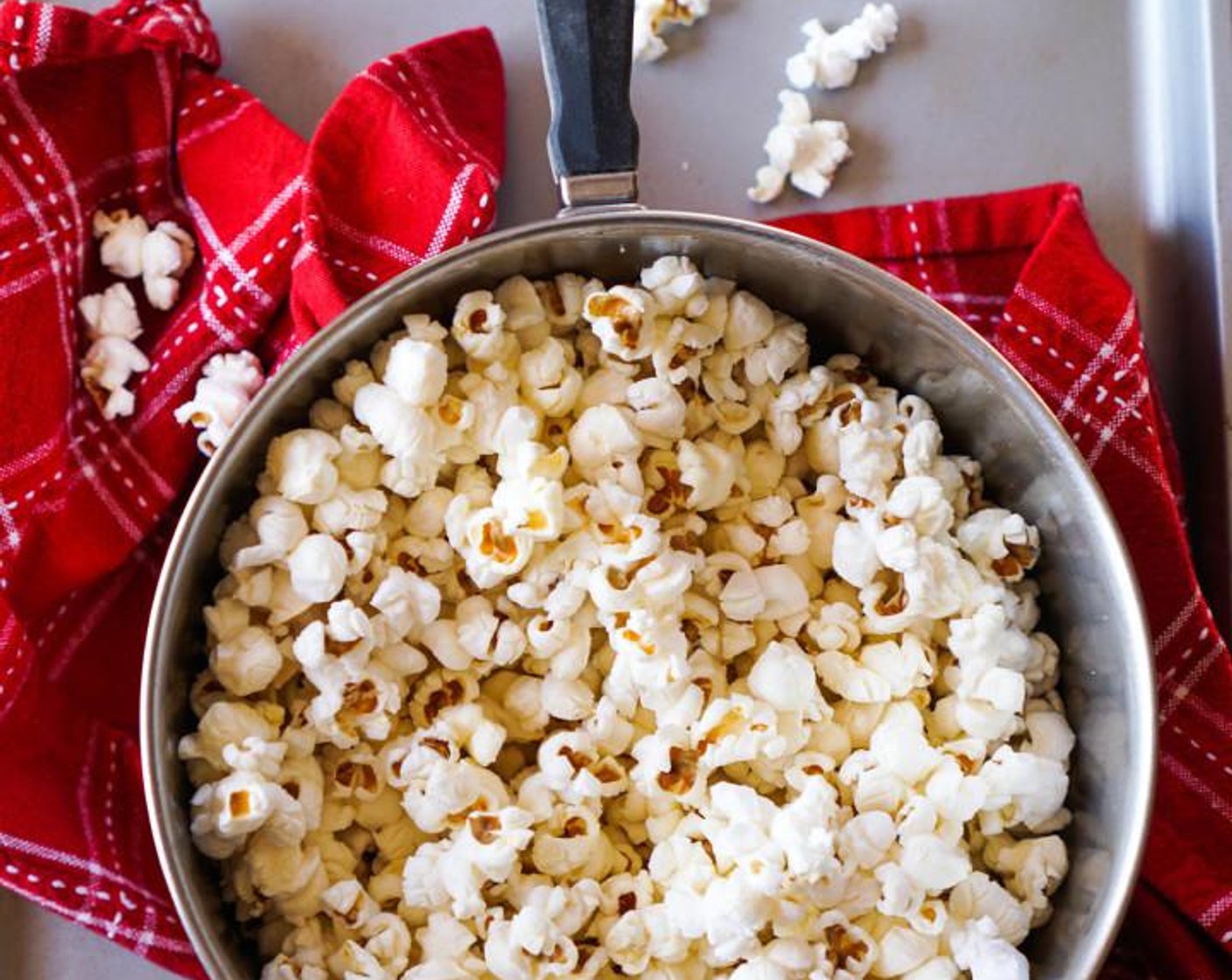 step 2 Cover the pan leaving the lid slightly ajar. Cook for 2-3 minutes, shaking the pot often until the popcorn kernels are completely popped.