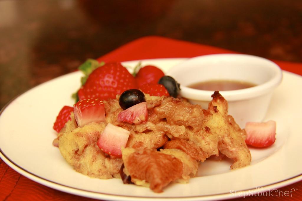 Step 9 of Berrylicious French Toast Casserole Recipe: Let cool and serve with your favorite syrup, honey or whipped cream.