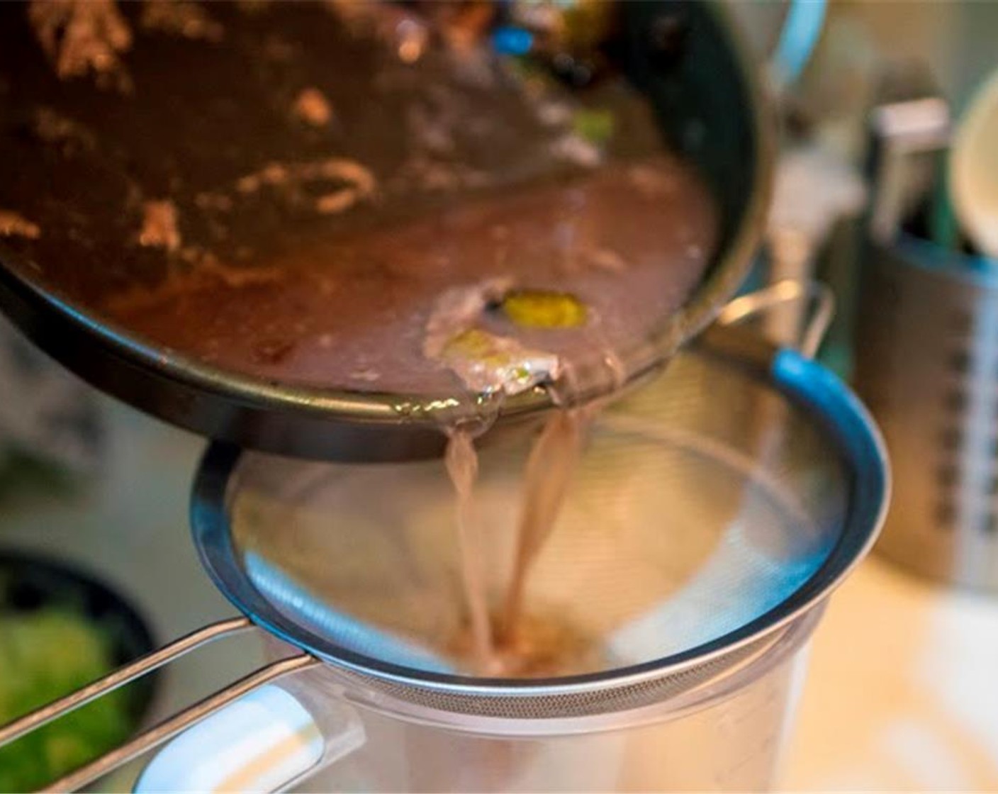 step 8 Transfer to a cutting board, and allow to rest for 15 minutes. Meanwhile, strain the pan au jus and set aside.