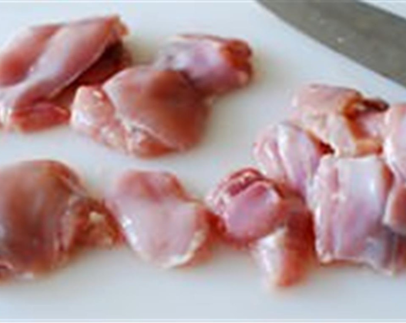 step 1 Rinse Boneless, Skinless Chicken Thigh (1 lb). Trim off excess fat. Cut each of the chicken pieces into small sizes (about 2 inches long and 1 inch wide).