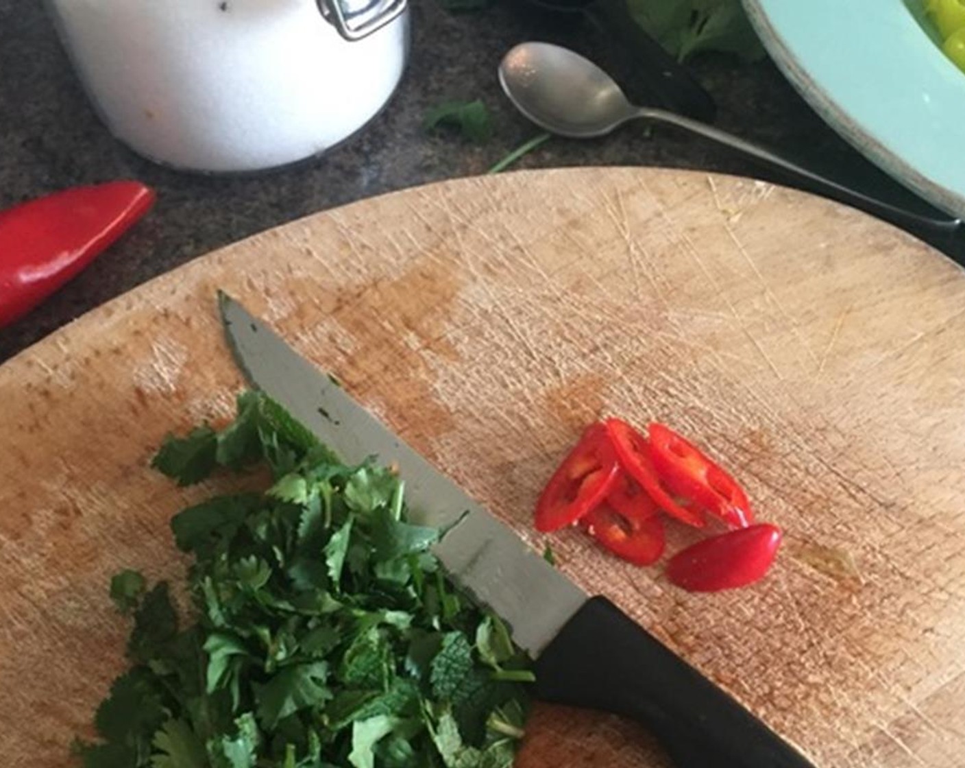 step 3 Shred some Little Gems Lettuce (1) and put it on a plate, and chop some Fresh Cilantro (to taste) and Fresh Mint Leaves (to taste). Prepare a few slices of Red Chili Pepper (1) ready to serve.