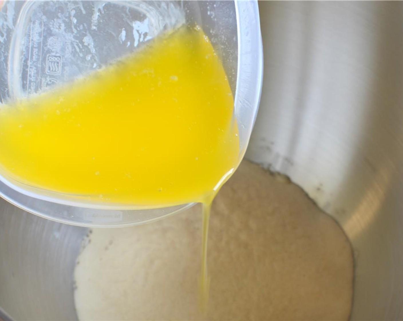 step 2 Once the yeast mix is bubbly, pour in the Butter (1/3 cup).