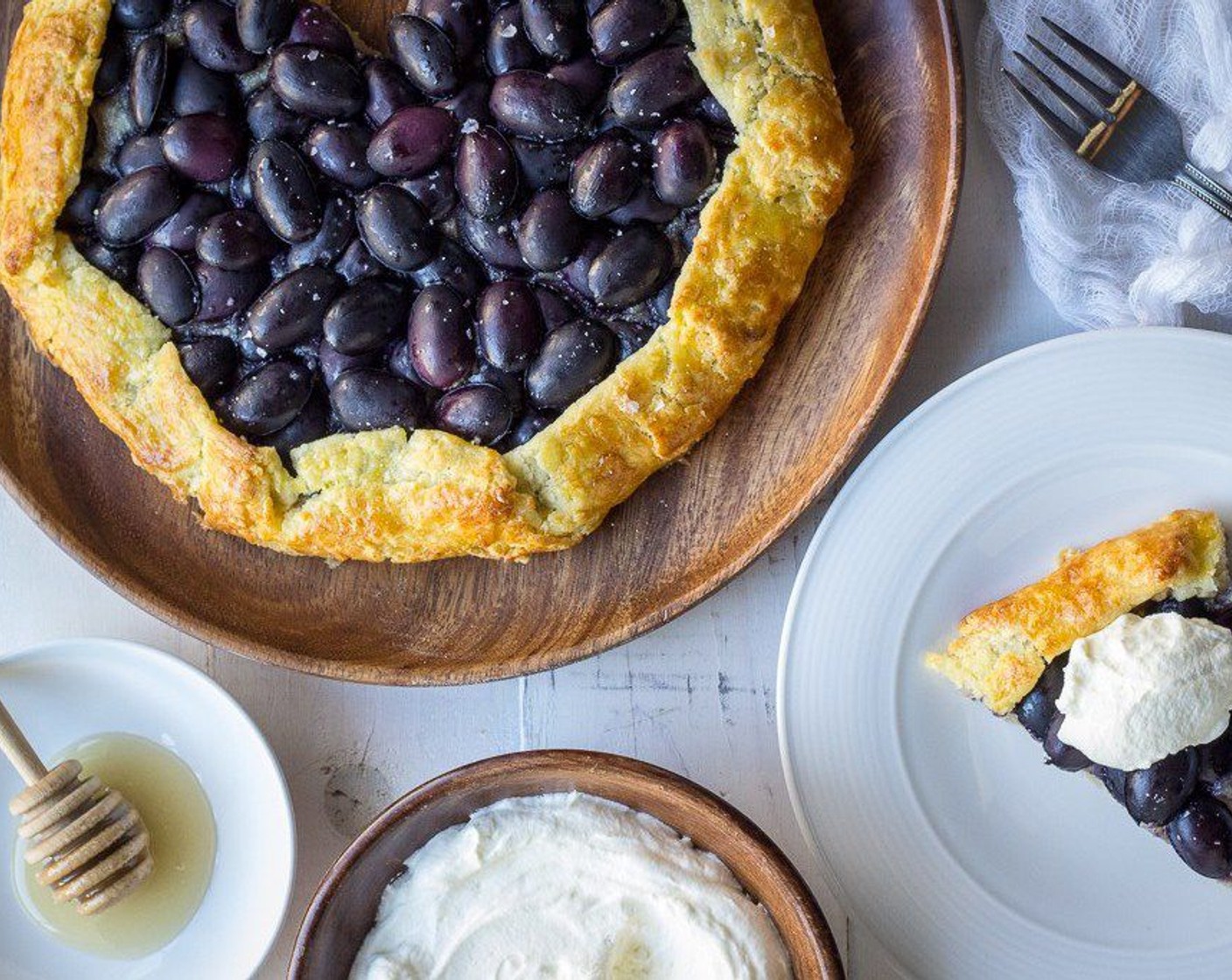 step 10 Serve galette with a dollop of greek yogurt whipped cream atop each slice. Enjoy!