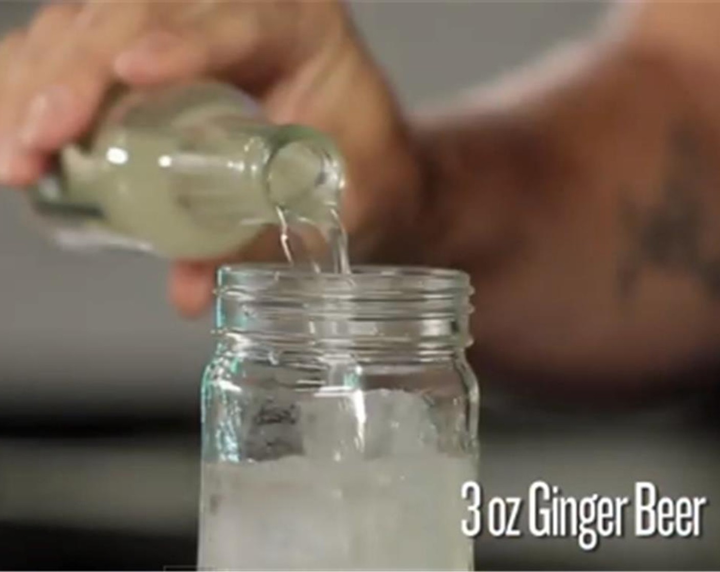 step 2 Pour into your glass or Mason Jar, Ginger Beer (3 fl oz), Lime Juice (to taste), and Angostura Bitters (1 dash).