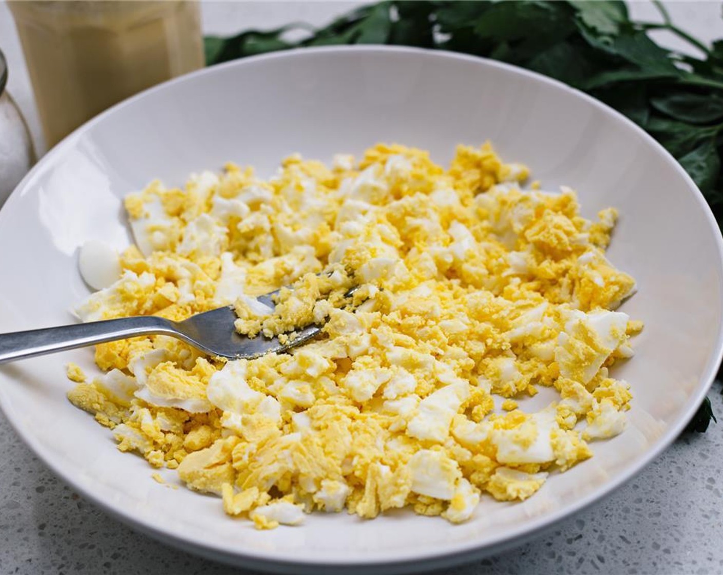 step 3 Mash eggs with a fork.