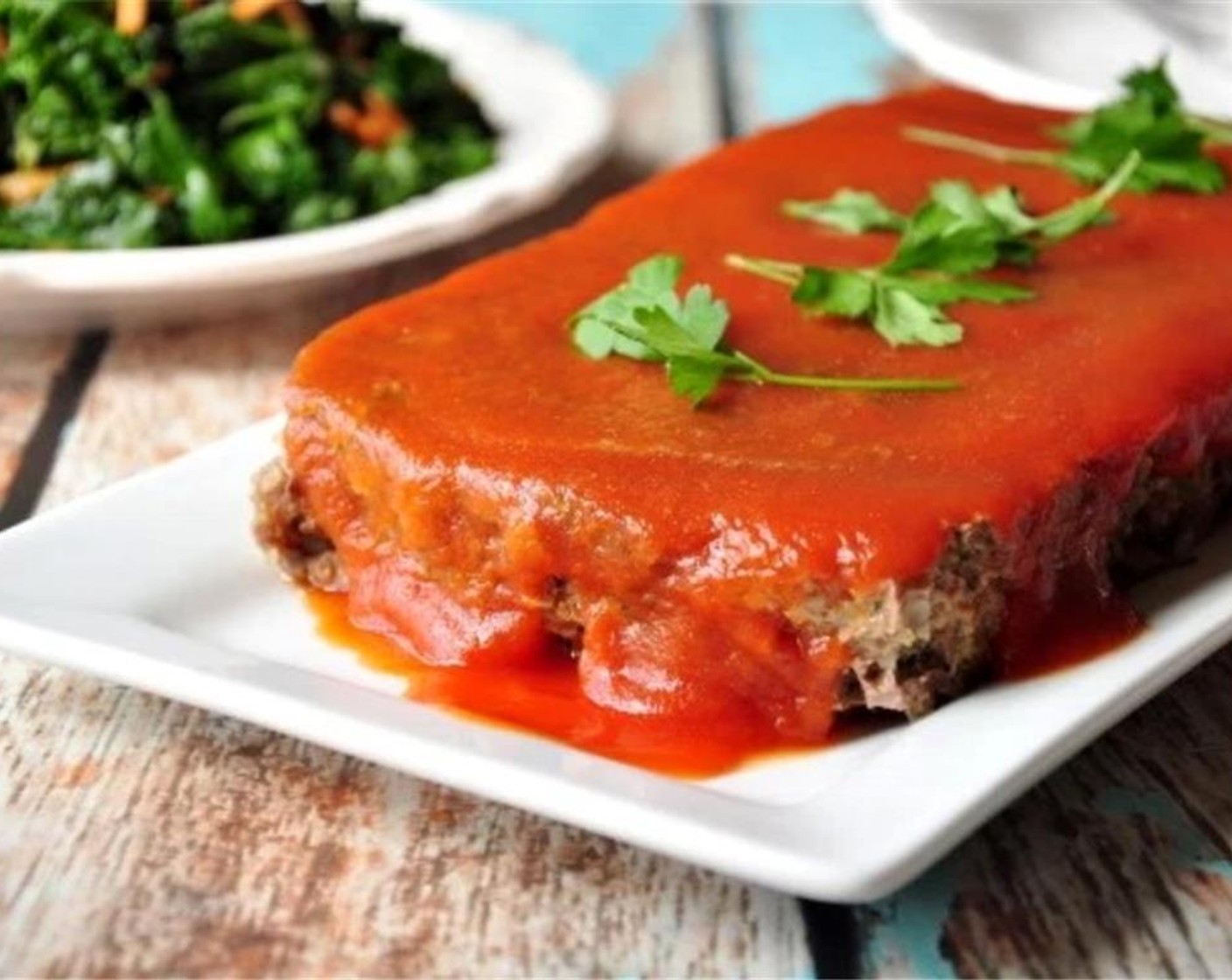 step 9 Top with Tomato Sauce (1 cup). Garnish with parsley.