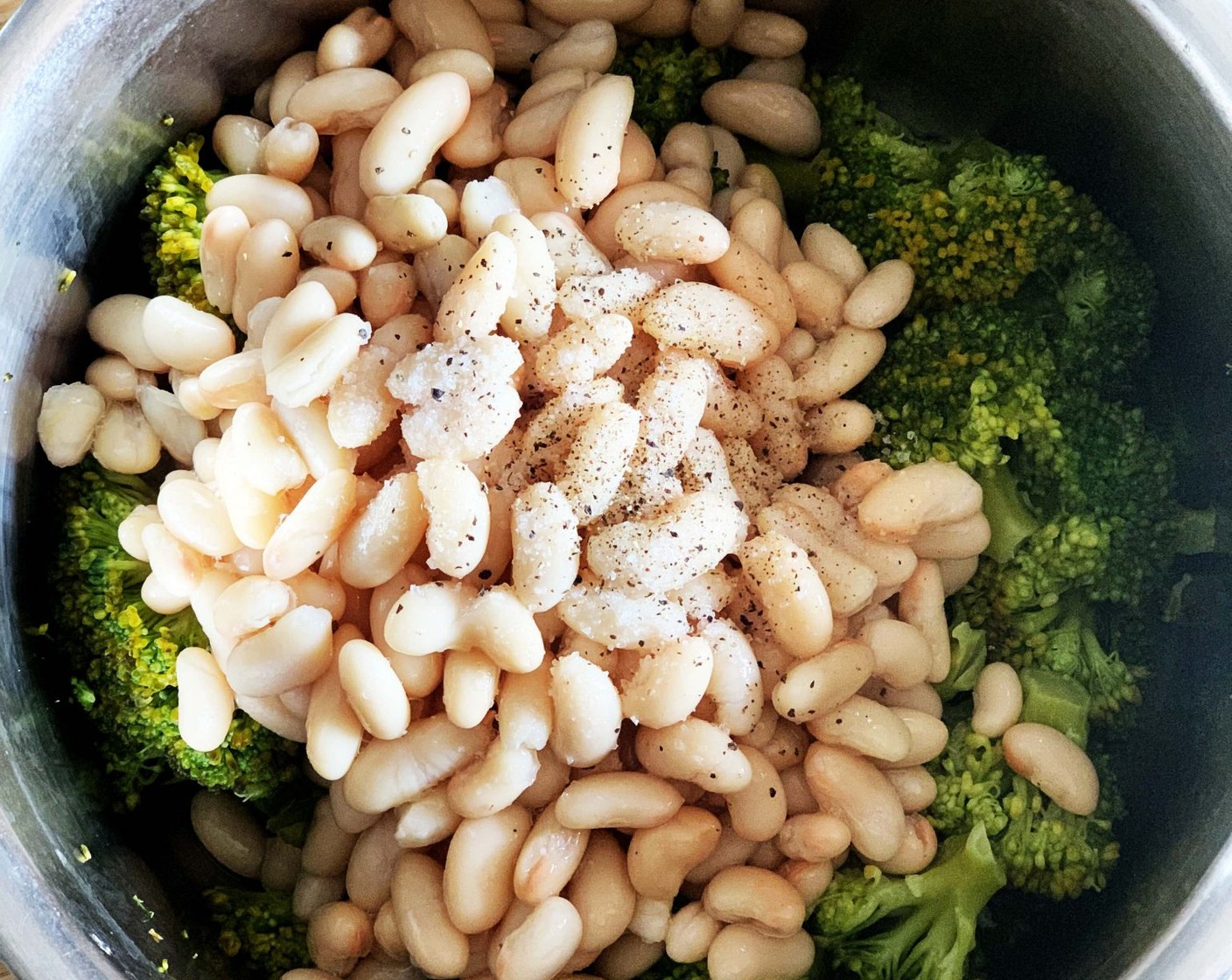 step 2 Add the Canned Cannellini White Kidney Beans (2 1/3 cups), Salt (to taste), and Ground Black Pepper (to taste).