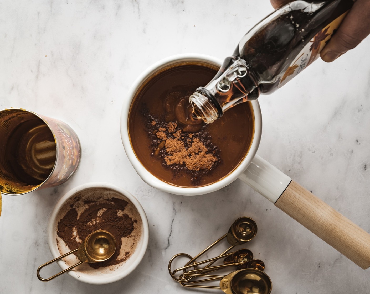 step 2 In a small pot, combine the 100% Pumpkin Purée (1 can), Maple Syrup (1/2 cup), Simply Organic Cinnamon, Ground (1/2 tsp), Ground Ginger (1/2 tsp), Ground Cloves (1/4 tsp), and Ground Nutmeg (1/2 tsp), place on the stovetop​ over medium-lo​w heat, stirring to combine.