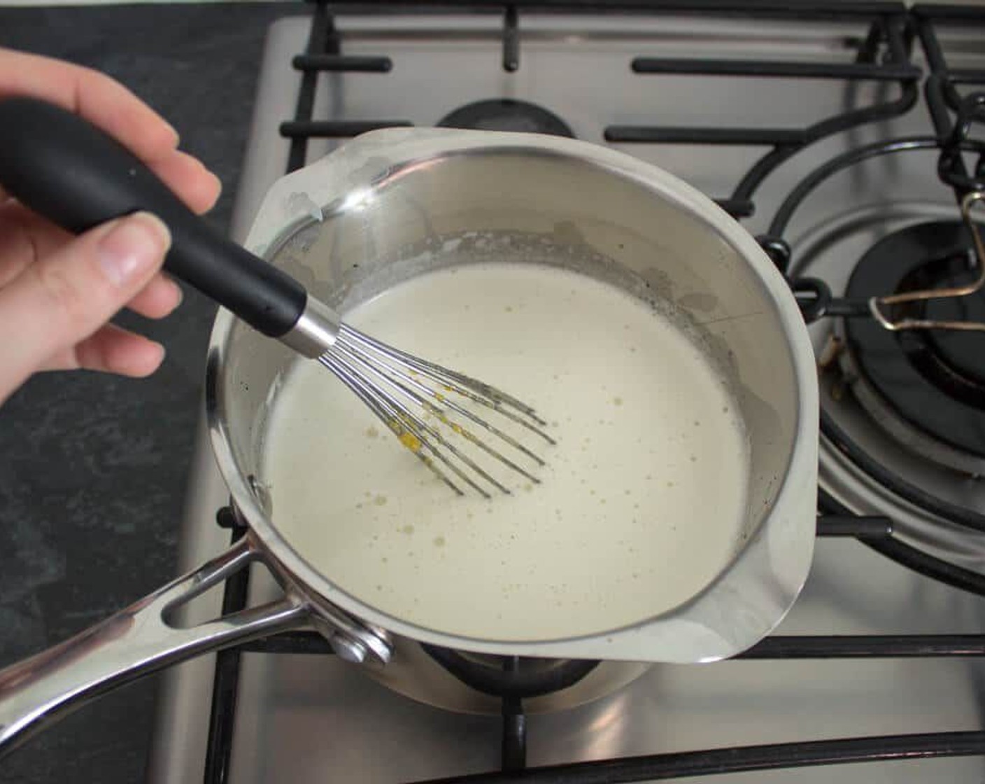 step 17 Pour about a quarter of the milk onto the egg mixture and whisk until there are no lumps. Pour this back into the pan with the rest of the milk and cook over a gentle heat, whisking constantly.