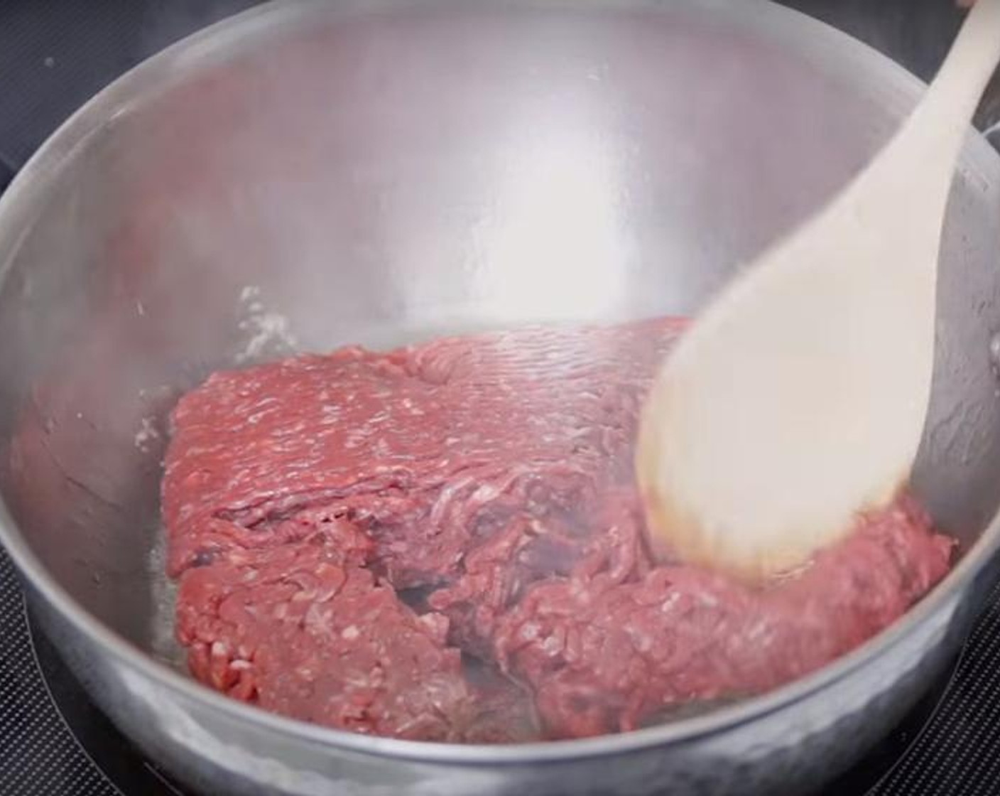 step 1 Heat Cooking Oil (2 Tbsp) in a large pot over medium high heat. Add Ground Beef (1 lb) and cook until mostly browned, breaking it up as you go, two to three minutes.