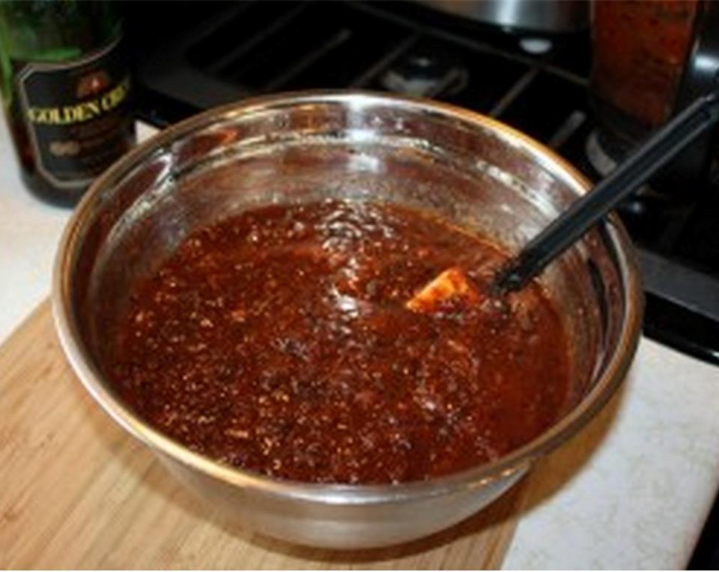step 3 Pour the entire mixture into a large bowl and add the Dark Spiced Rum (2 cups) and sherry mixture.
