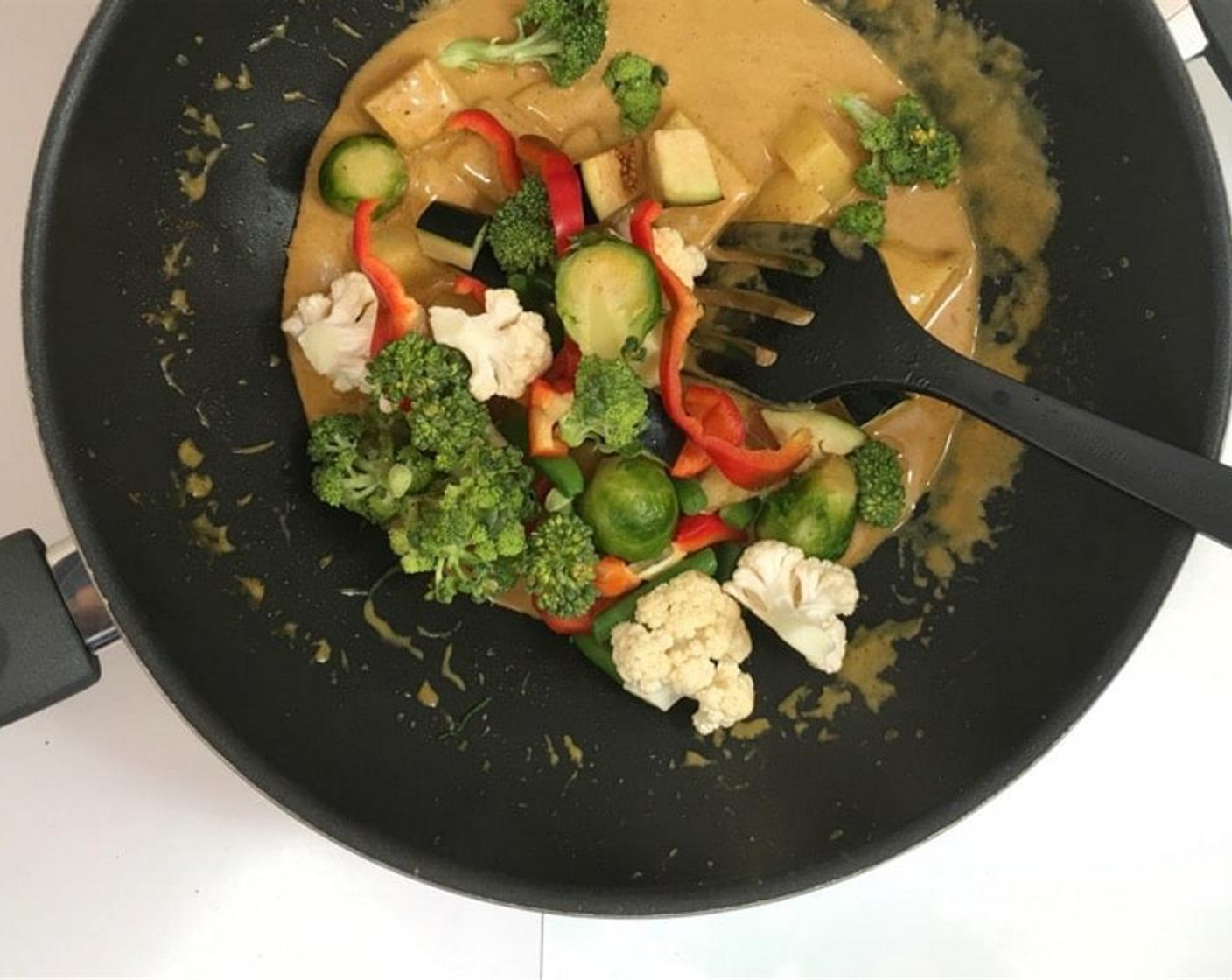 step 5 Stir and put a lid on the pan. Cook the potatoes for 5 minutes. Then add the rest of the chopped vegetables.