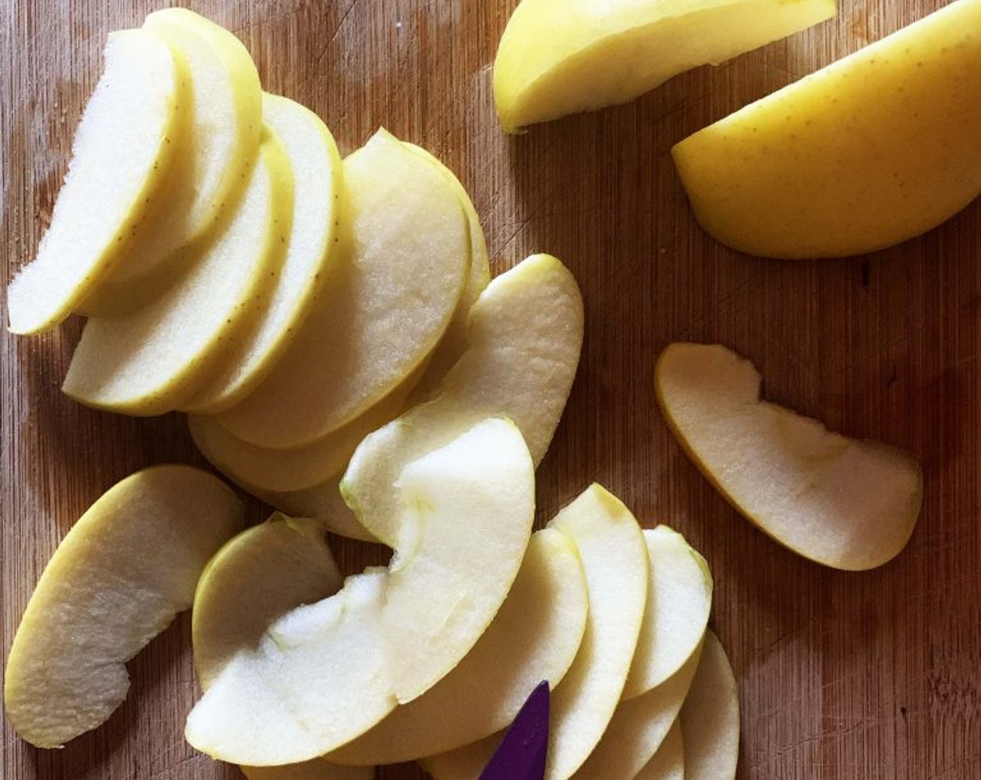 step 3 Next, move on to slicing the Apples (2). Make sure to get very thin slices that will not break when folded.